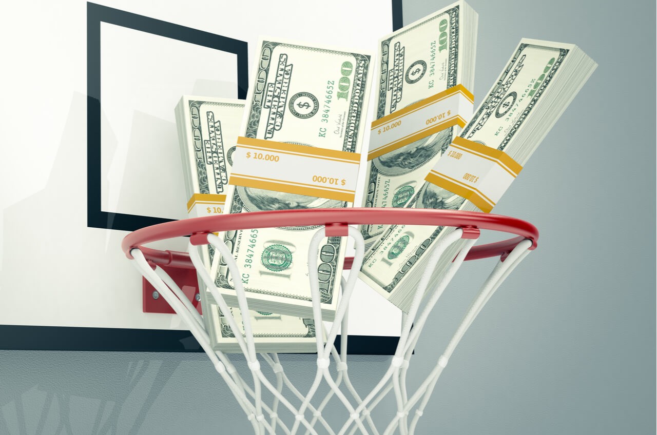 bricks of money in basketball hoop